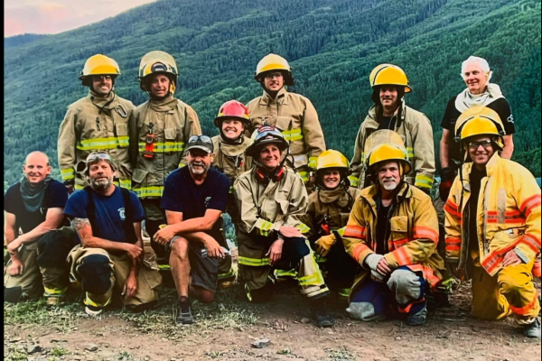 firefighting crew posing in their gear